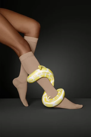 Image of a compression stocking with a snake wrapped around it