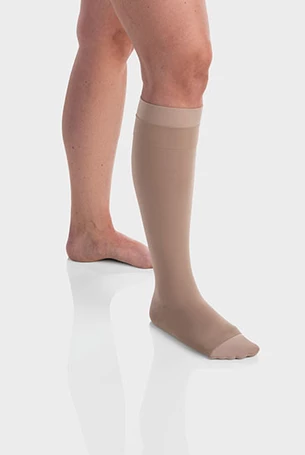 Image of a leg wearing an ulcer stocking